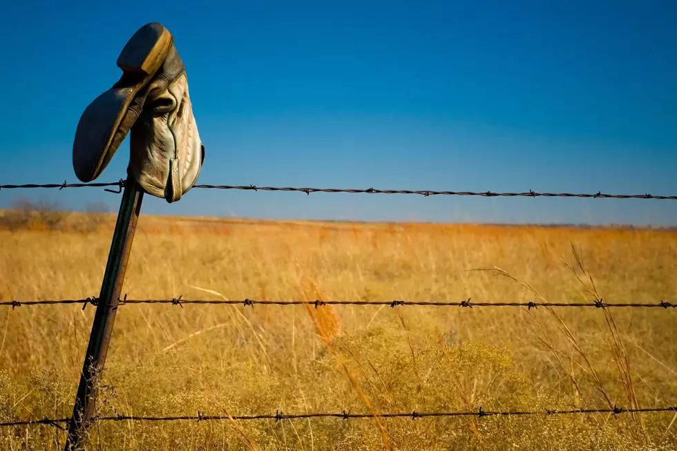 Here&#8217;s What Cowboy Boots Perched on New England Fence Posts Mean