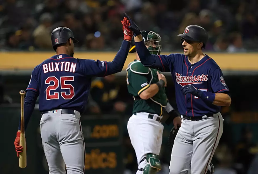 A’s Top Twins 8-6