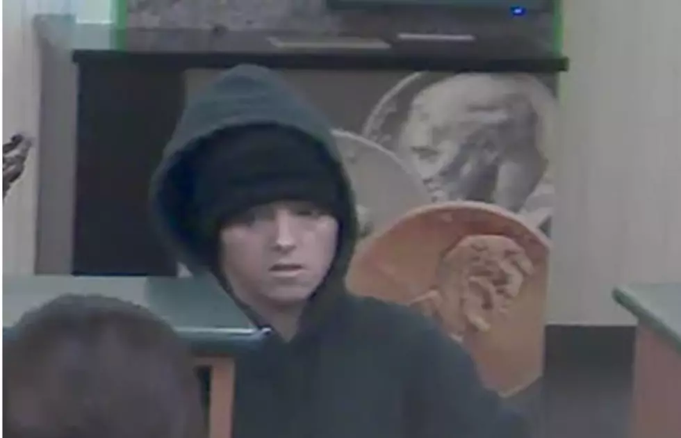 Woman Robs Bedford Bank