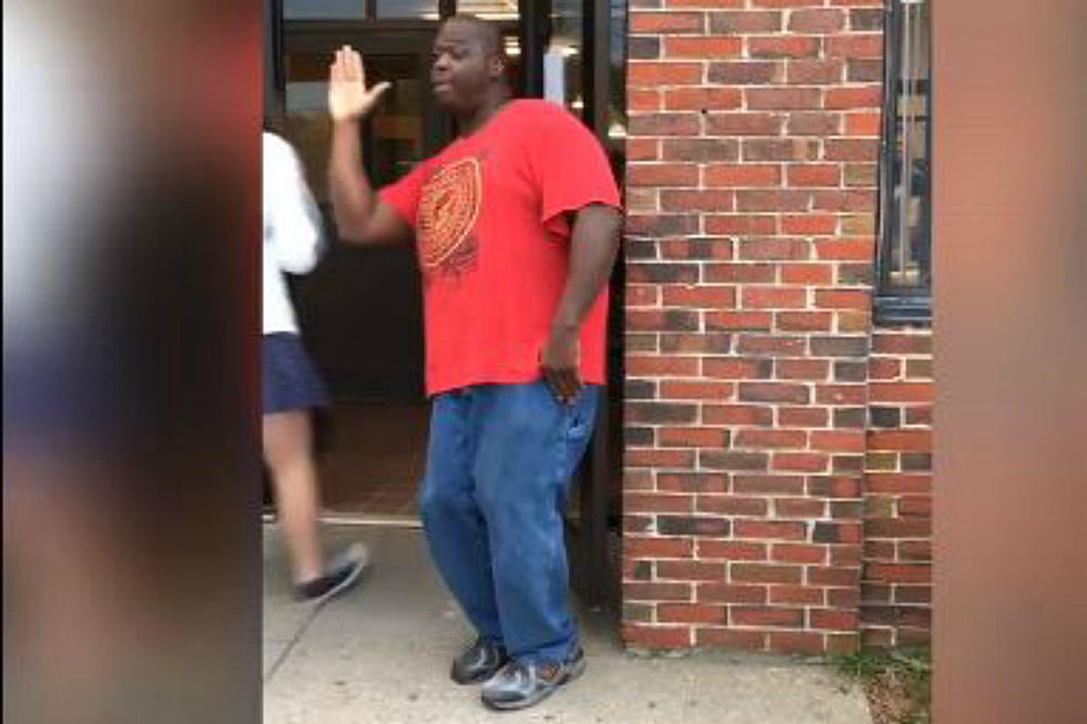 This Custodian at Merrimack High School Spreads Positive Vibes via High Fives