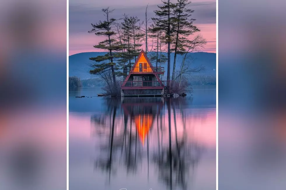 A Frame Cabin on Its Own Island in NH is Elegant Serenity