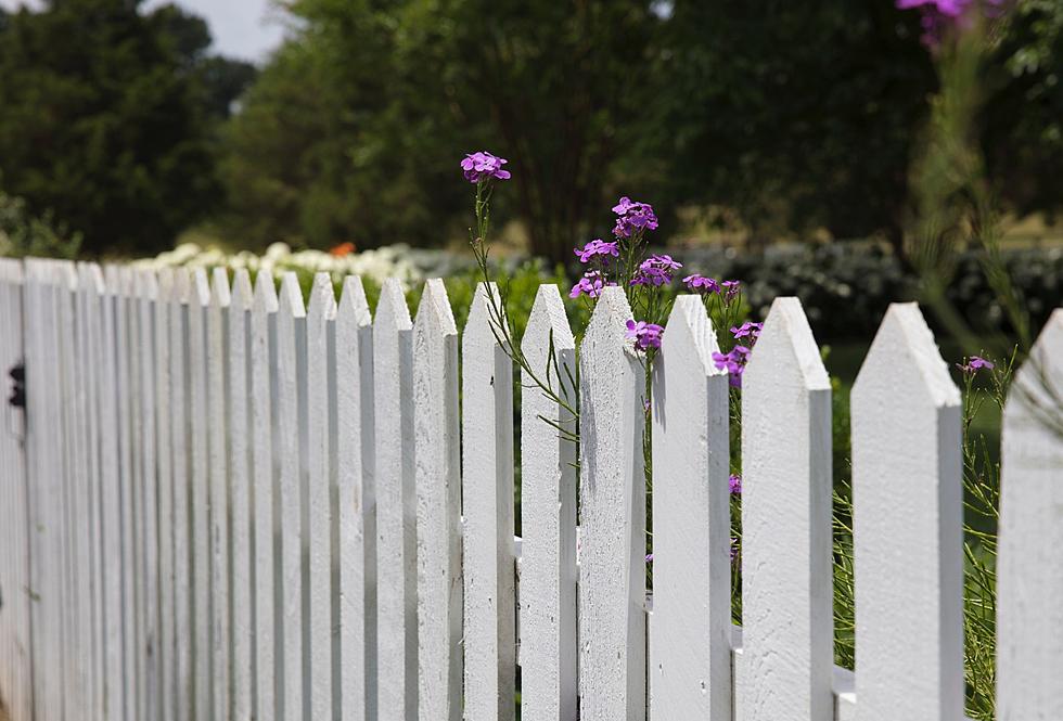 Who Legally Owns the Fence Between Two Houses in Massachusetts?