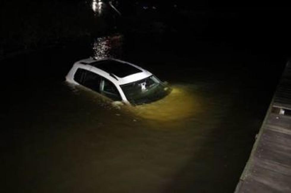 Car Ends Up in The Hudson, Driver Arrested for Fraud