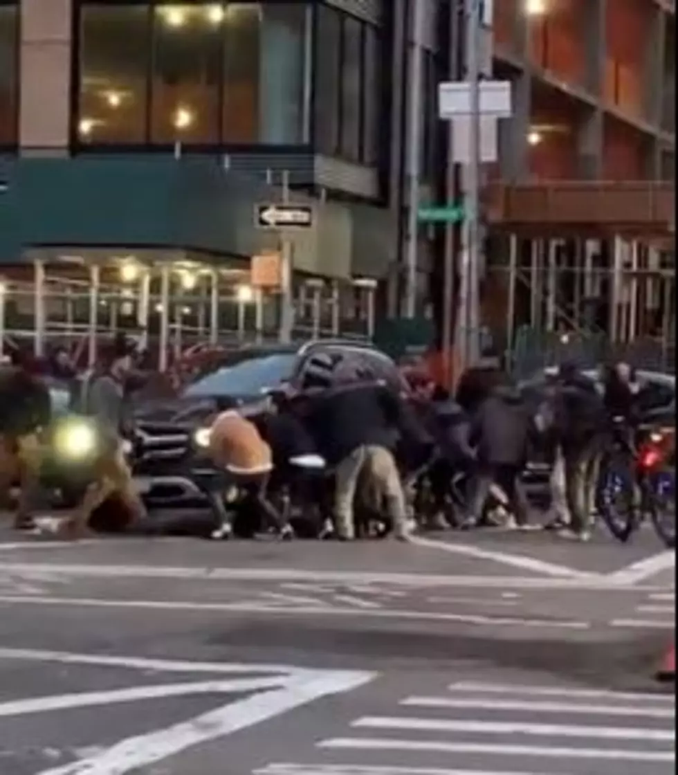 Watch New York Heroes Lift SUV to Save Trapped Woman