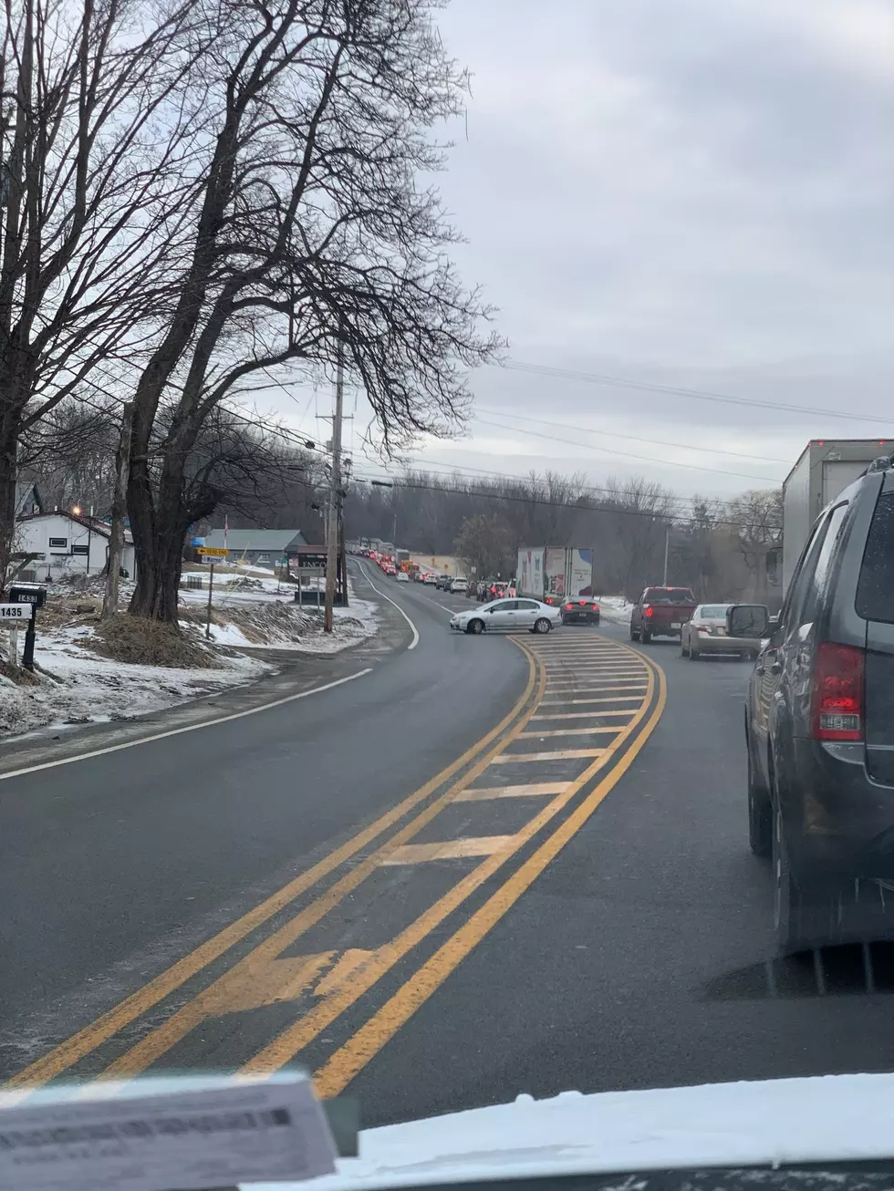 Car after car decided to make a U-turn instead of waiting in this massive line of traffic outside of Marlboro, NY (Jonah)