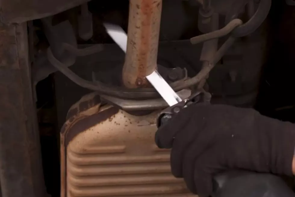 The catalytic converter under your car just needs a few quick cuts to remove (CNET Cars via YouTube)