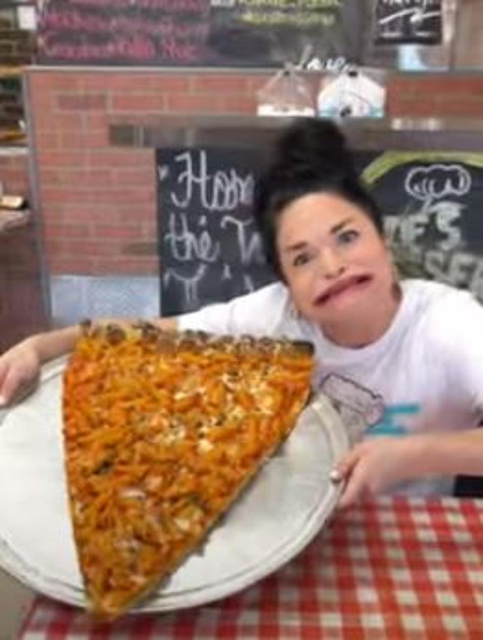 Influencer With Huge Mouth Takes Large Pizza Slice