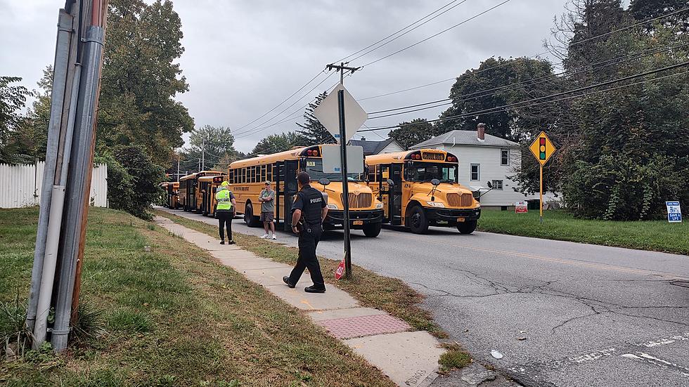 Police and Buses Line Up Outside of Hyde Park Central Schools