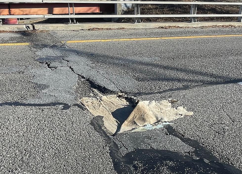 Massive Crater on New York Highway Stuffed With Carpet