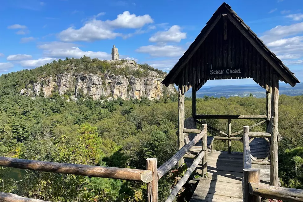 A summerhouse at Mohonk Mountain House with Sky Top Tower in the background
