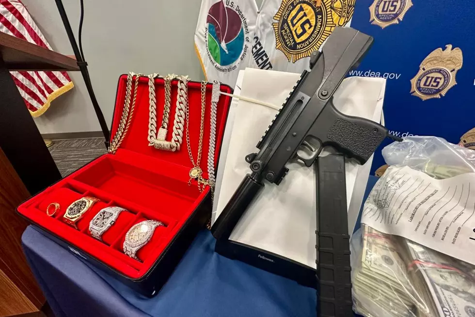 In addition to drugs and cash, police seized guns, jewelry, and watches (New York State Police via Facebook)