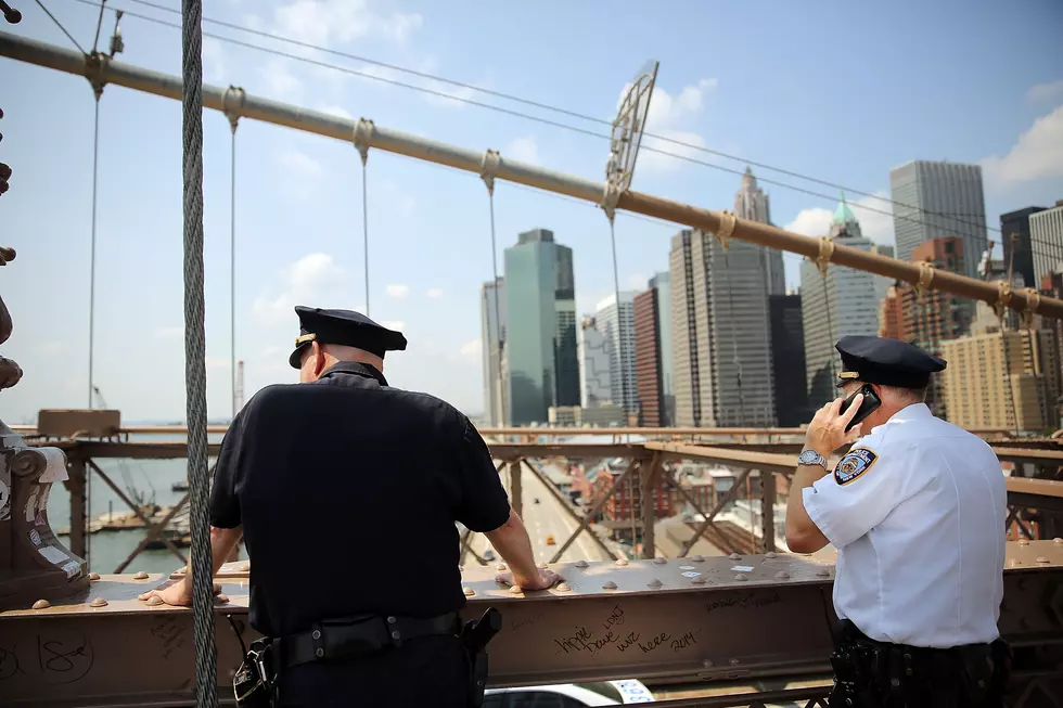 Mysterious White Flags Fly Atop Brooklyn Bridge
