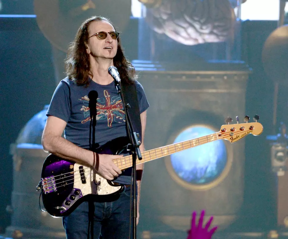 Geddy Lee And Bobblehead Accept Challenge