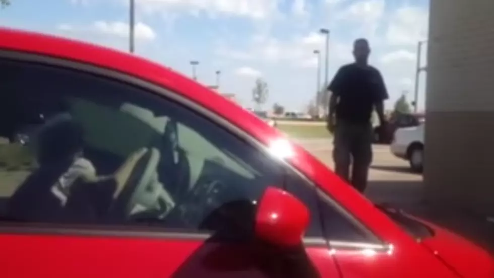 Man Confronts Panhandler Allegedly Driving New Car