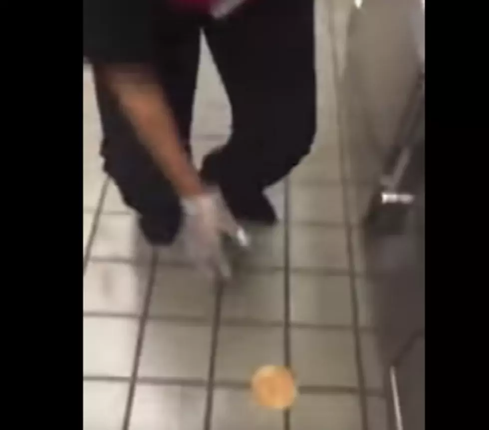 Fast Food Employee Wipes Bun on Dirty Floor, Uses it to Make Sandwich [NSFW VIDEO]