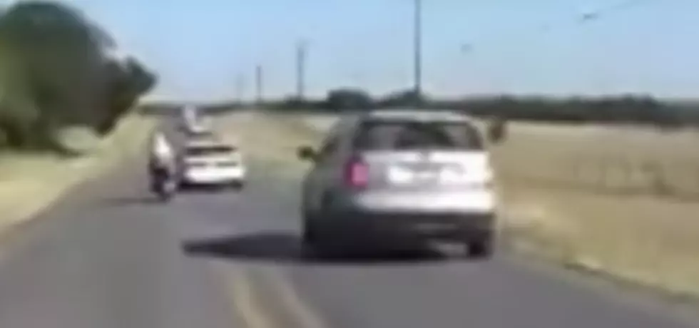 Driver Shows No Remorse After Veering into Motorcycle, Injuring Passenger [VIDEO]