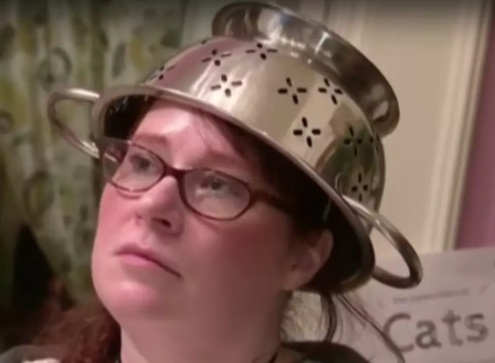 Woman gets Permission to Wear Spaghetti Strainer For License Photo