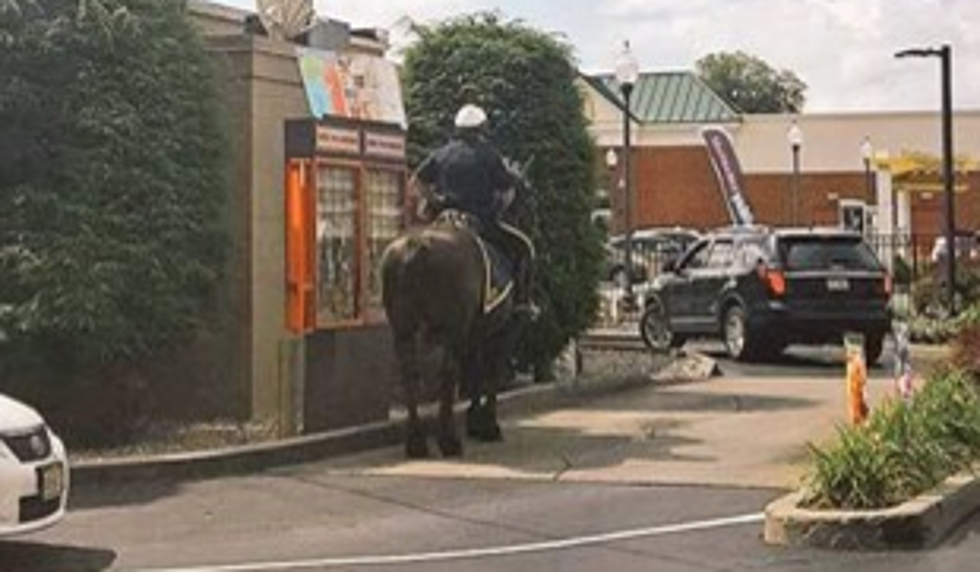 Mounted NY Police Officer and His Partner Enjoy a Snack at the Drive-Thru [PIC]