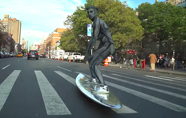 Guy Dressed as Silver Surfer Rides the Streets of New York City [VIDEO]