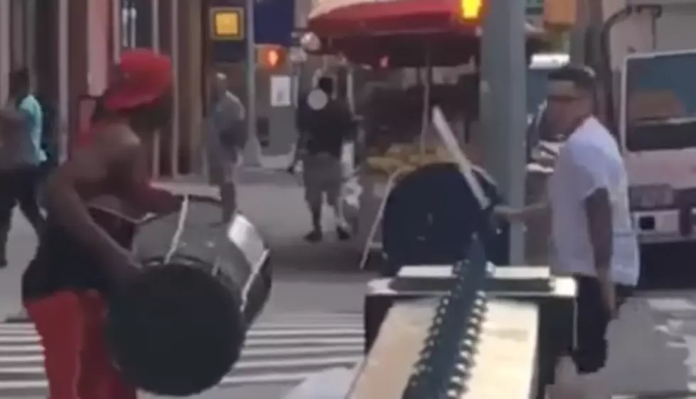 Man With Machete vs Man With Trash Can. Who Will Win? [VIDEO]