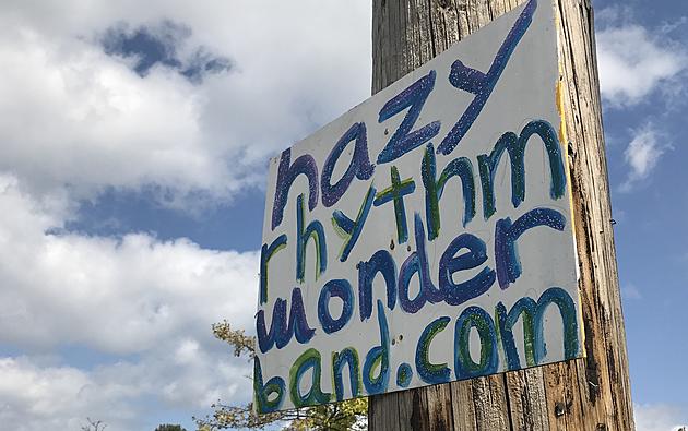 The Story Behind Those Mysterious &#8216;Hazy Rhythm Wonder Band&#8217; Signs