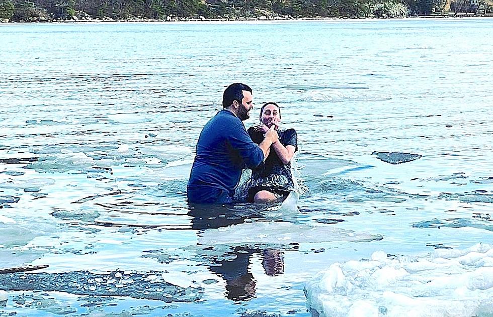 Religious Ceremony Takes Place in Freezing Hudson River Waters