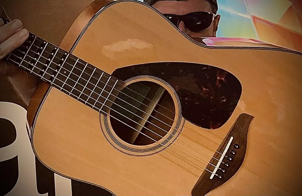 Hopkins Learns Guitar the Easy Way This Holiday Season