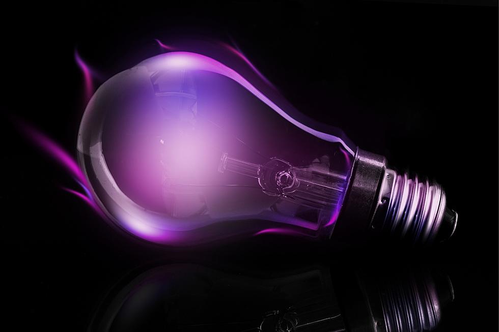 Why Do New Yorkers Have Purple Light Bulbs on Their Front Porch?