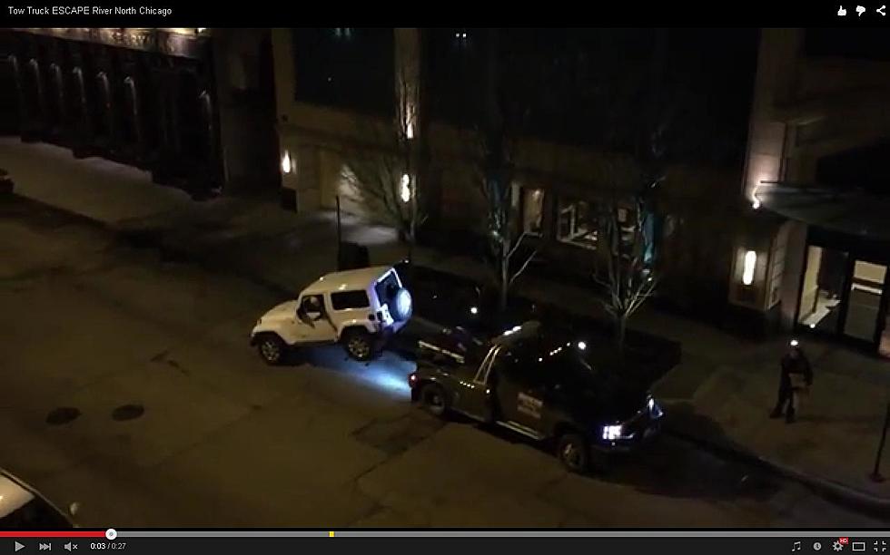 A Guy Getting Towed Drives His Car Off the Tow Truck (VIDEO)