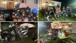 Car Rolls Over into a Home on Residential Street in Poughkeepsie, New York