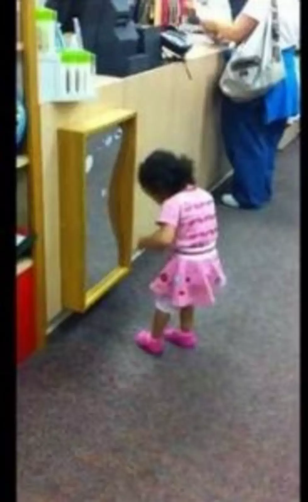 Toddler Busts A Move After Checking Herself Out In A Store Mirror [Video]