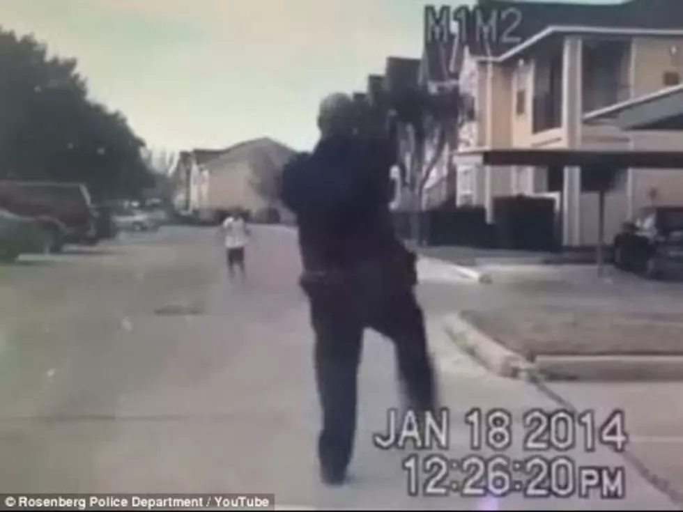Watch a Police Officer Stop and Play Catch With a Kid Playing Alone