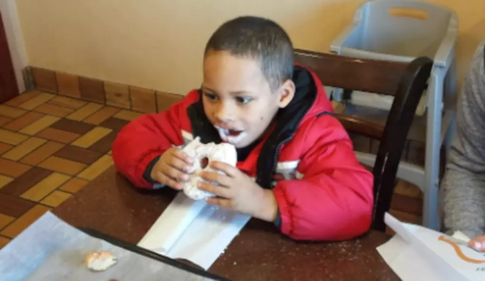 Five Year Old Is Adorable Eating a Donut Bank Donut [WATCH]