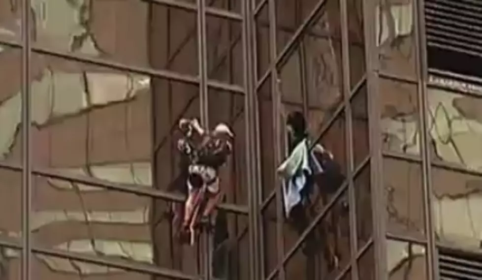 Currently a Man is Climbing the Trump Tower With Suction Cups! [VIDEO]