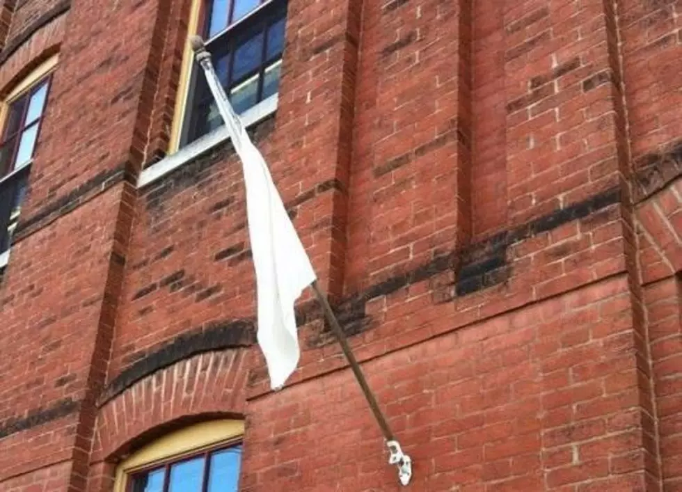 United Caring Services Will Have the White Flag out Tonight