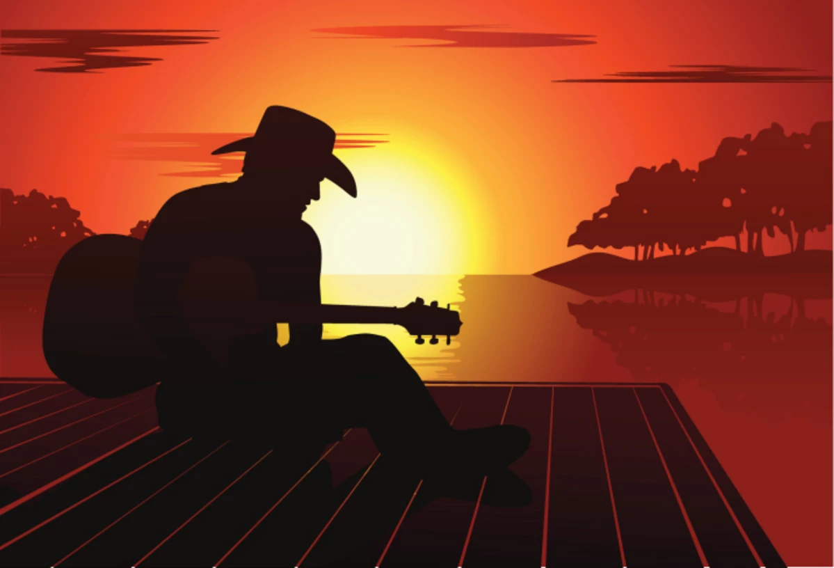 Песня ковбоя популярная. Ковбой на закате. Гитарист на закате. Ковбой с гитарой. Мужчина в шляпе с гитарой.