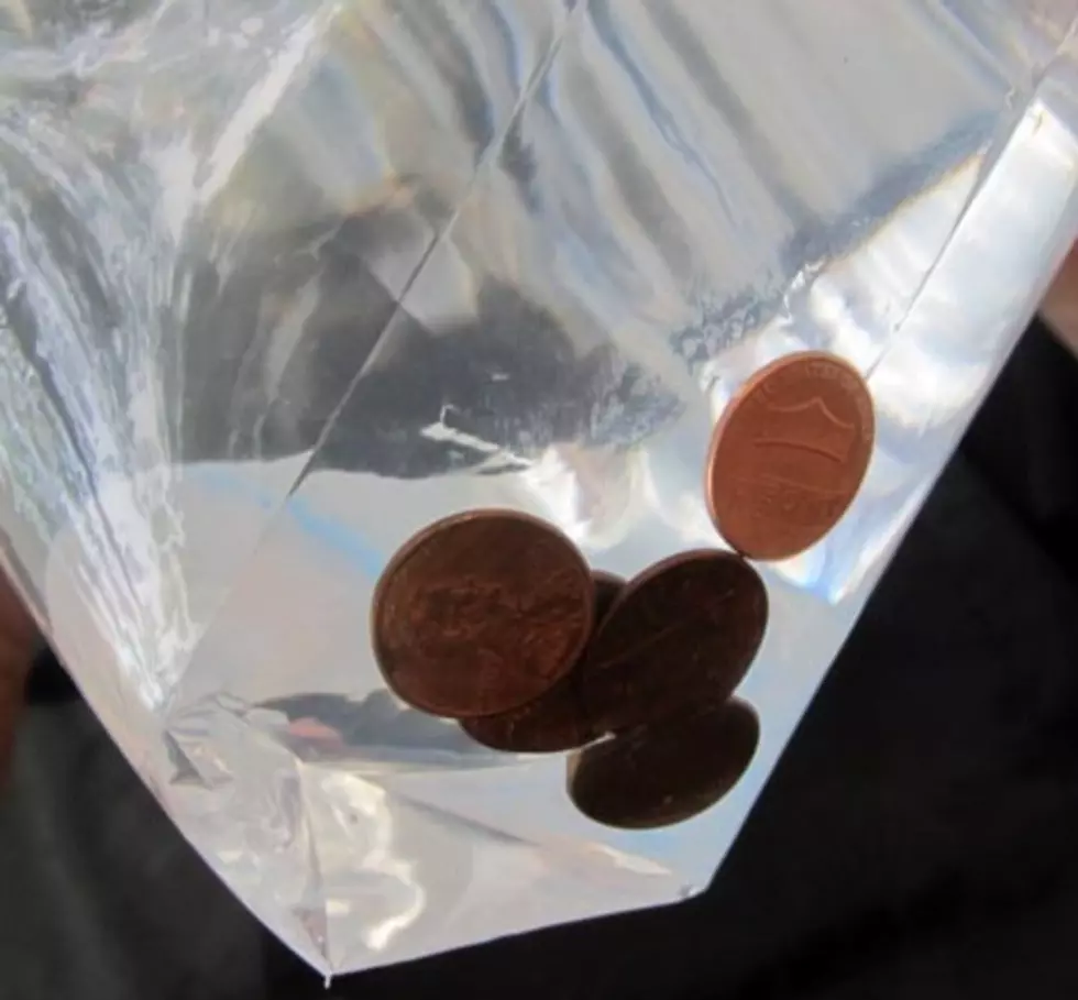 Hang a Bag of Pennies and Water Outside Your Door? Why?