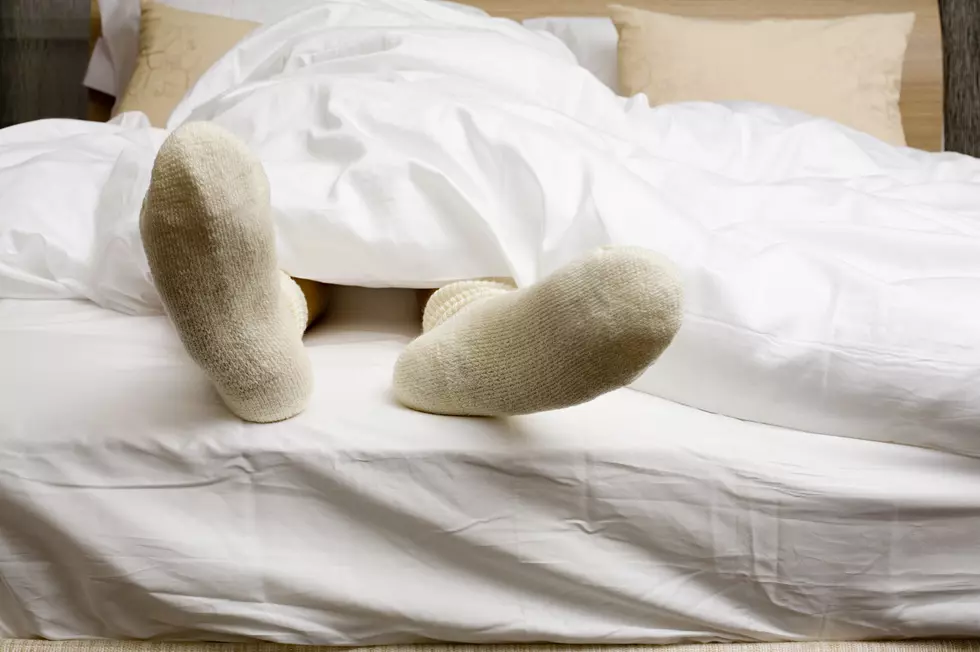 Here's Why Wearing Socks To Bed Will Help You Fall Asleep Faster