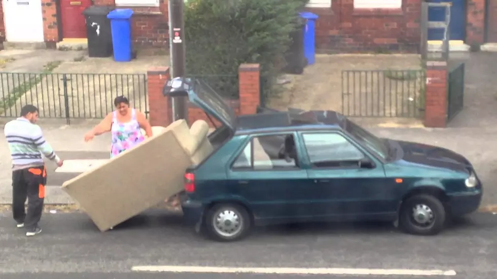 Three Idiots Try to Fit a Big Sofa in a Tiny Car