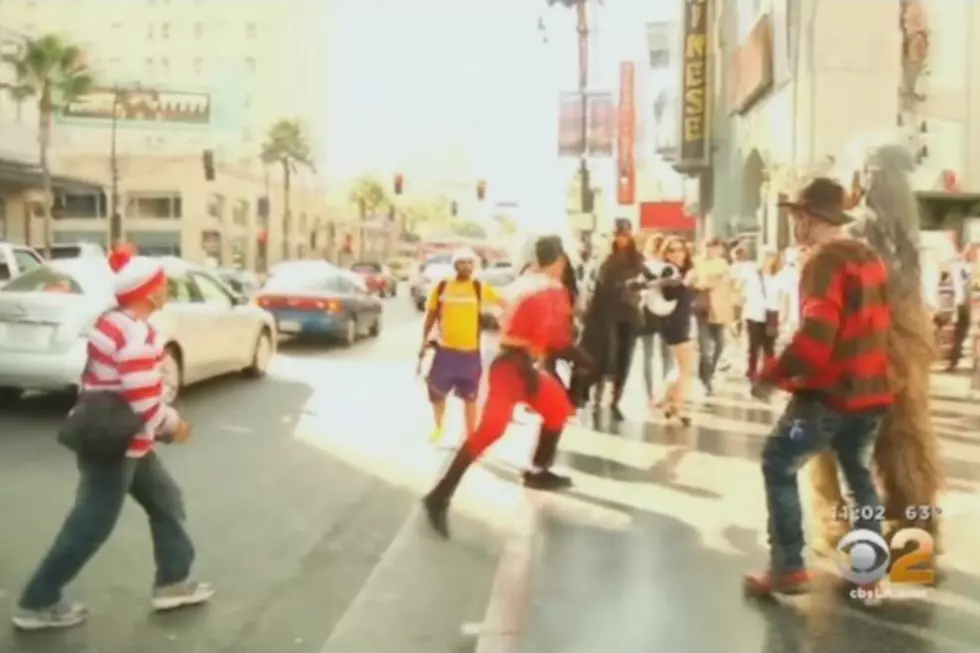 Characters Brawl On Hollywood Boulevard