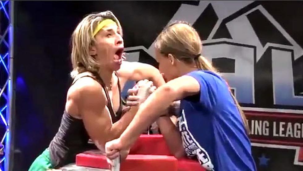 Woman Unleashes Her Inner Demon During Arm Wrestling Match