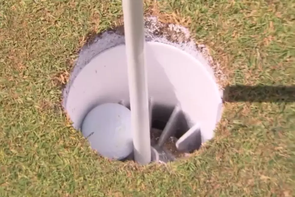 Golfer Makes a Crazy Hole-in-One on a Par Four