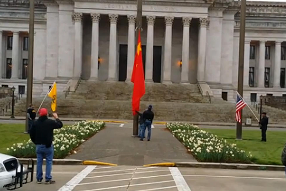 Patriots Tear Down Communist Flag at State Capitol