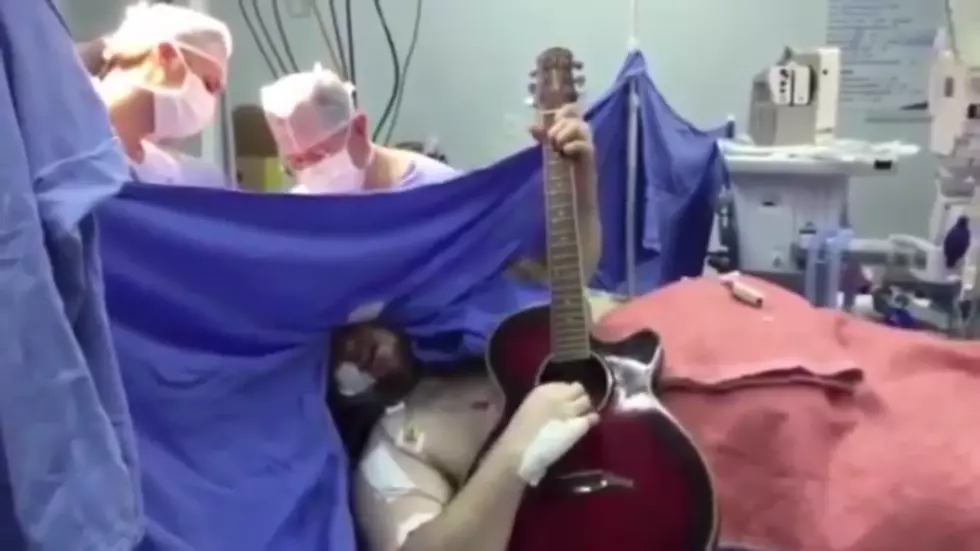 Guy Plays Guitar While Having Major Brain Surgery