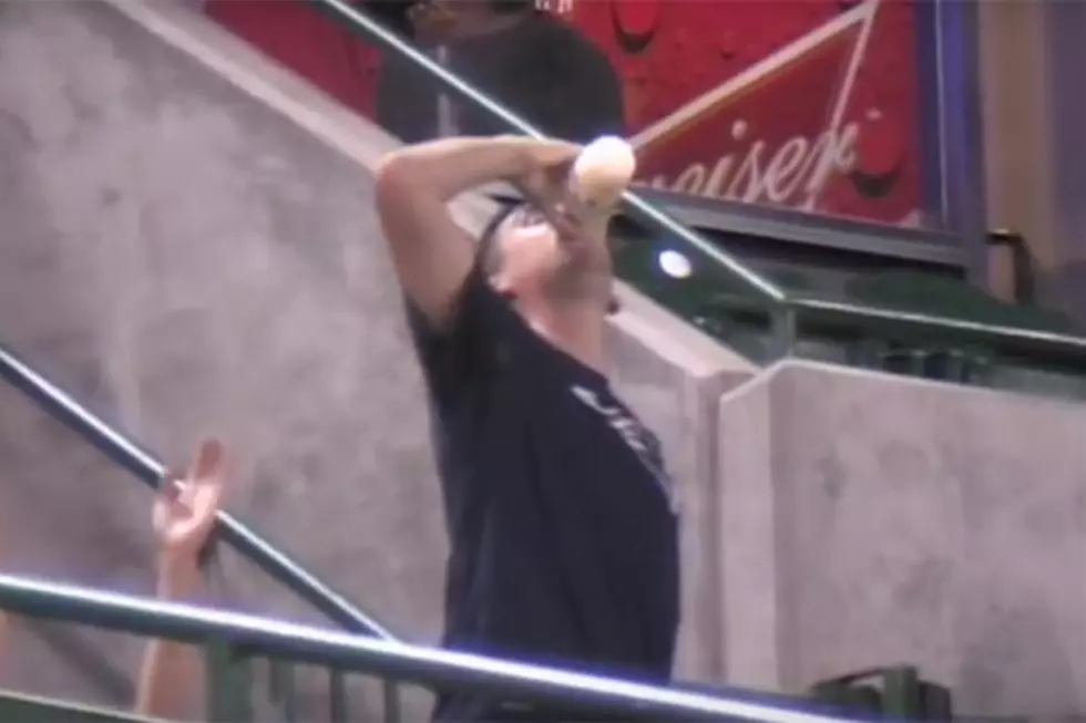 Baseball Fan Catches a Foul Ball with His Beer, Chugs it Like a Champ