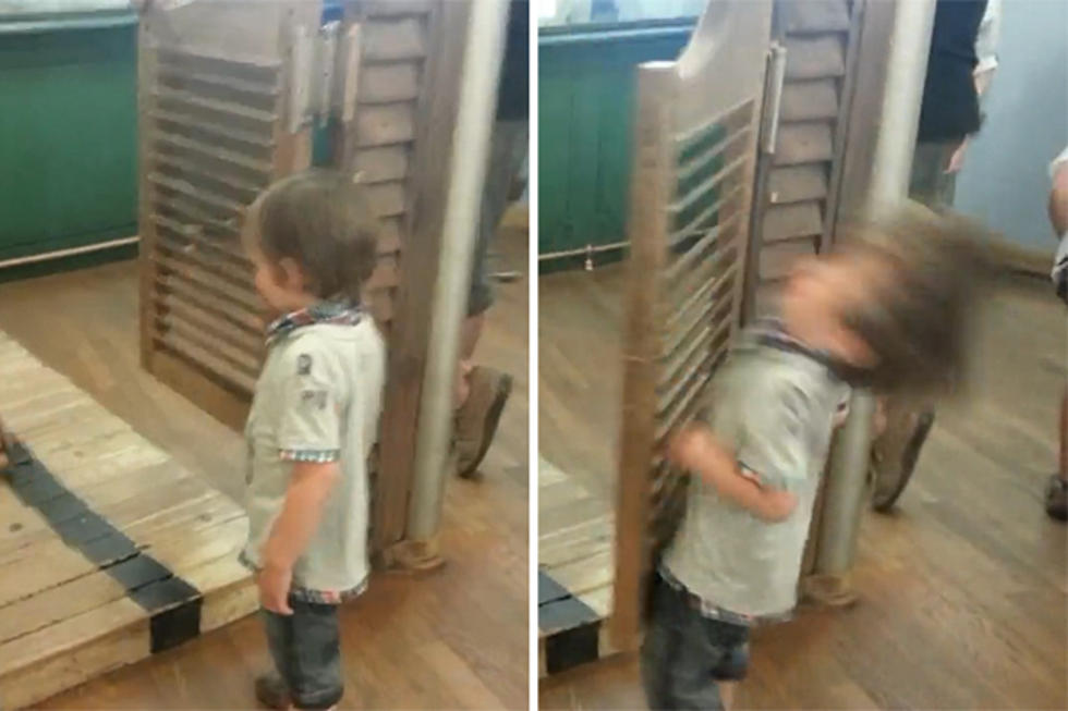 Kid Gets Slammed by Swinging Door