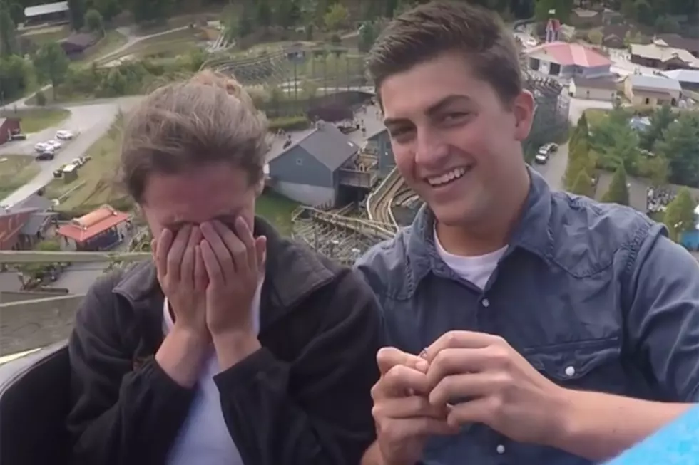 Man Pops The Quesiton at the Top of a Roller Coaster