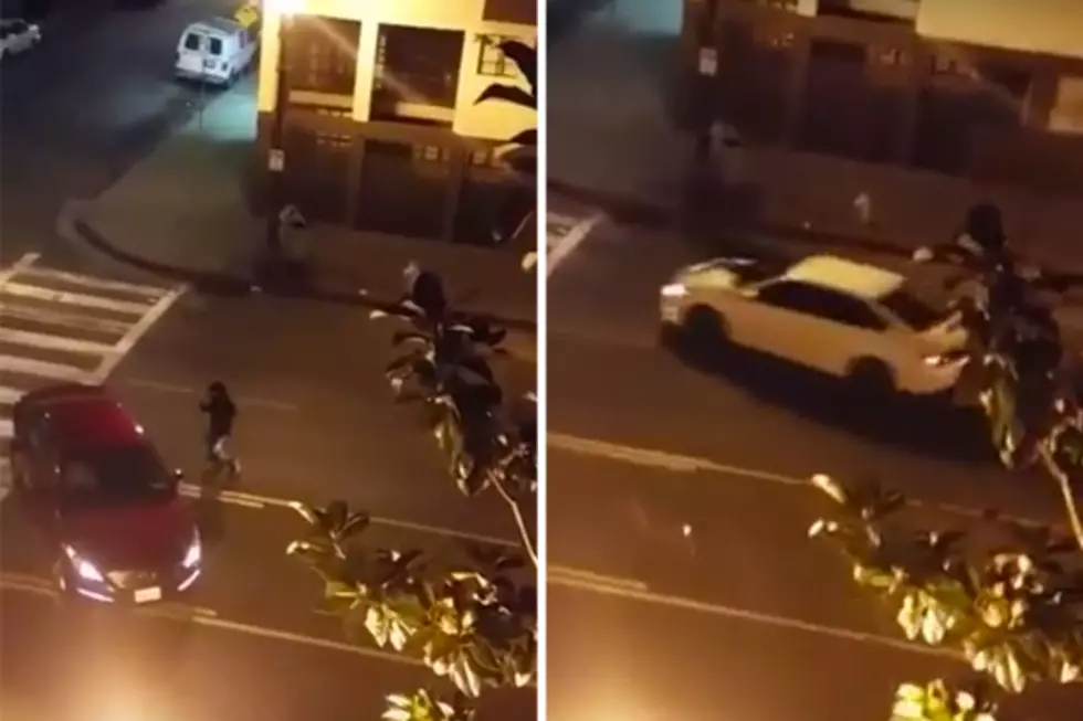 Crazy Guy Wielding a Machete Attacks a Car, Gets Ran Over