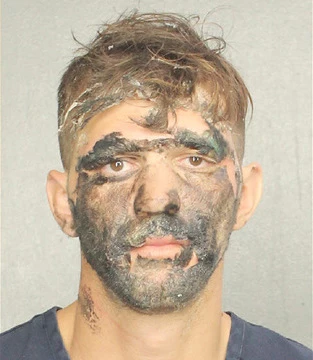Face-Painted Man Arrested With Brass Knuckles and Double Edged Knife