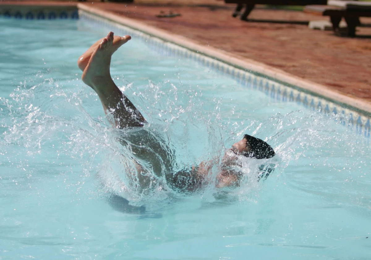 Guy Falls Off an 11th Story Balcony, Lands in a Shallow Pool and Survives